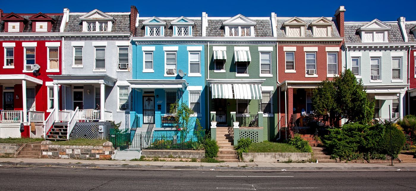 A row of individual residential townhouses