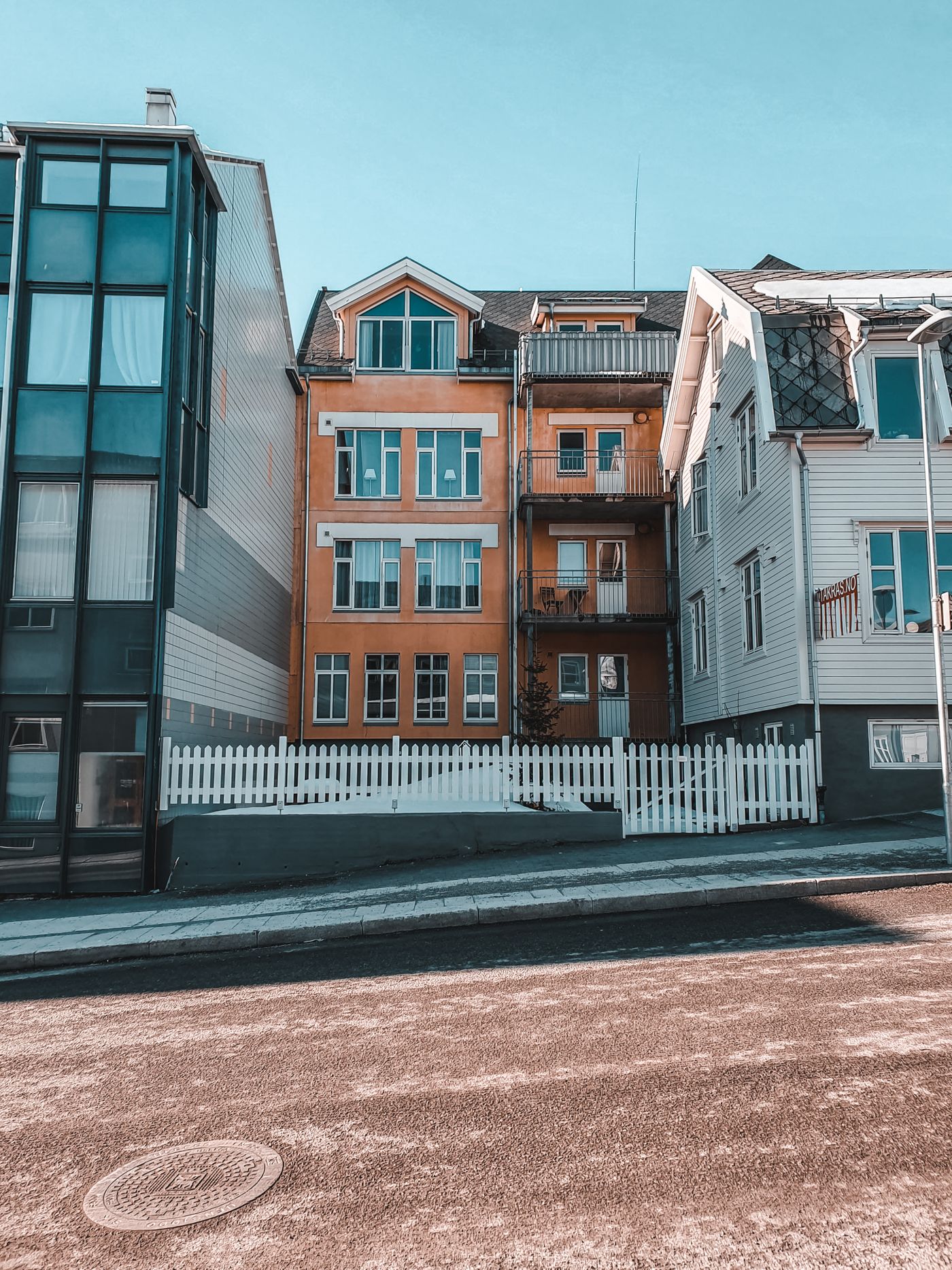 Urban apartment facades along a residential street