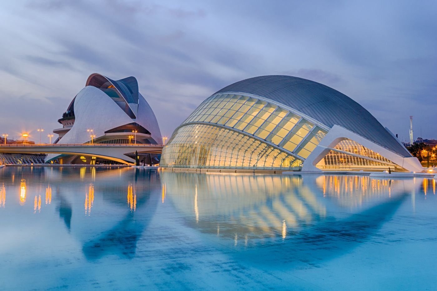 Sculptural contemporary architecture reflected in water