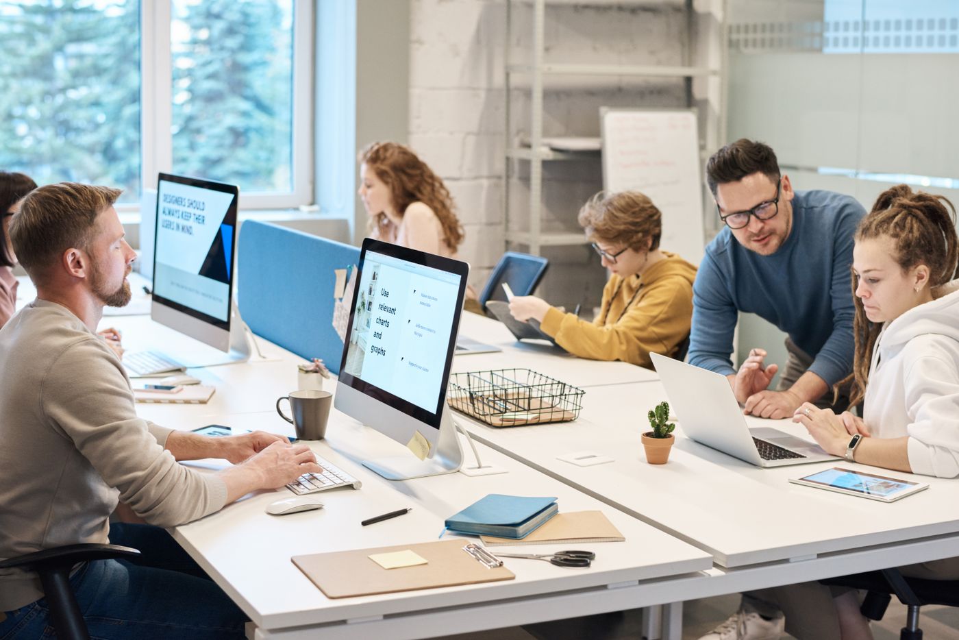 Colleagues collaborating in a modern office
